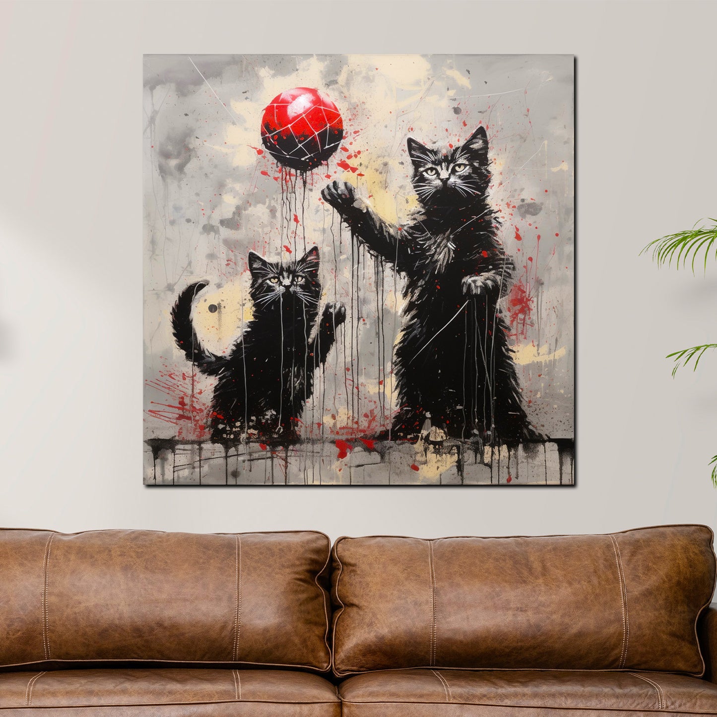 Quadro moderno astratto due gatti neri che giocano con una palla rossa