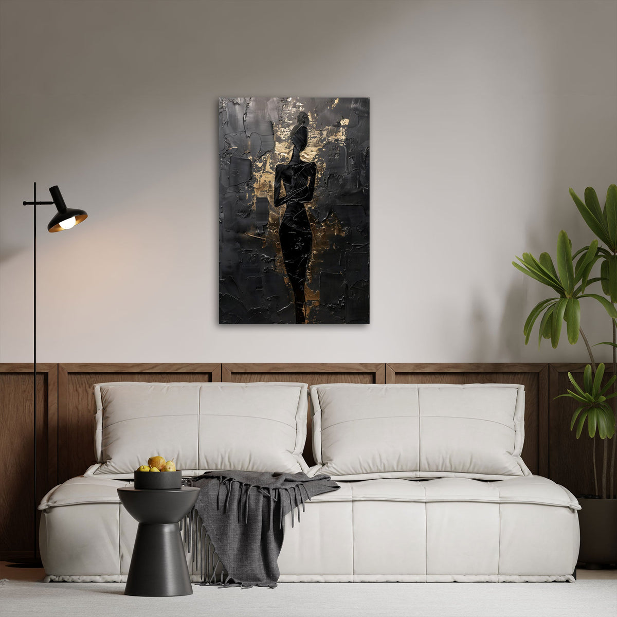 Quadro donna elegante nero e oro in soggiorno
